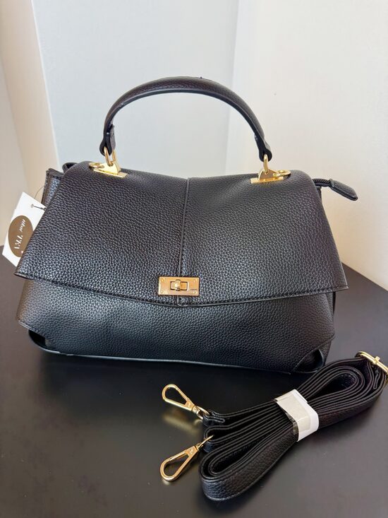 MELNĀ AR ZELTA FURNITŪRU 